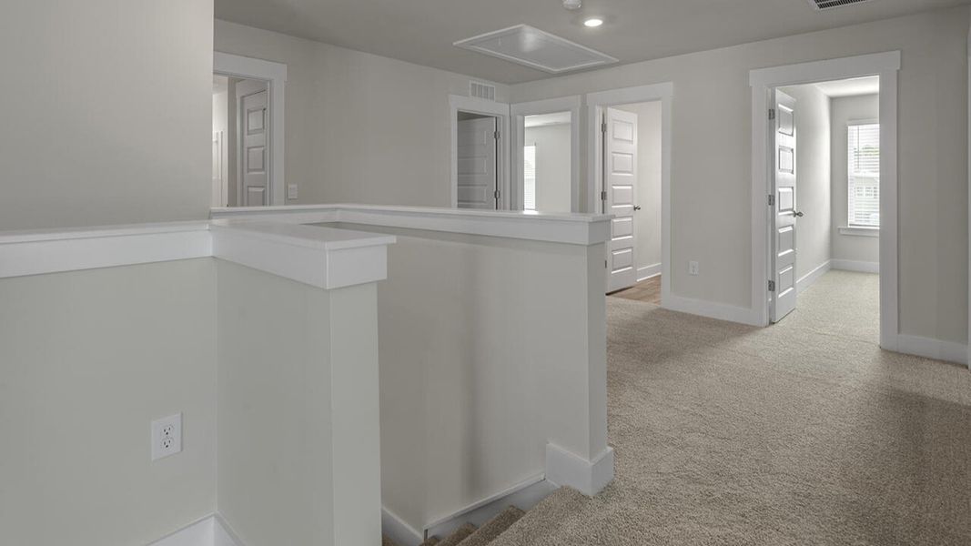 Spacious, unfurnished interior of a new home in Surfside Landing, Hubert (Image 29).