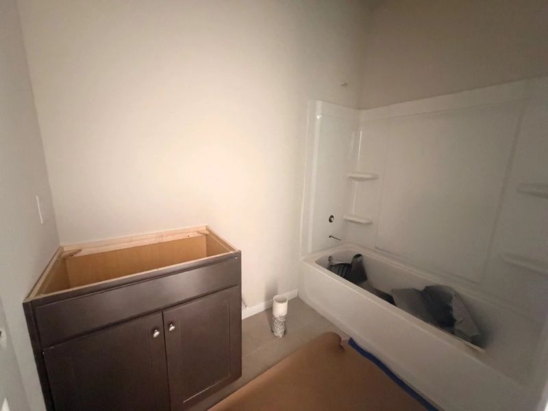 In-progress construction of a new home in The Colony, Bastrop, TX (Image 7).