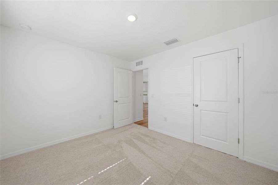 Spacious, unfurnished interior of a new home in , Port Charlotte (Image 39).