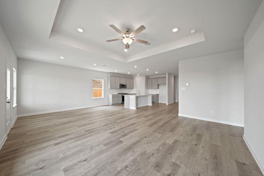 Spacious, unfurnished interior of a new home in Sunterra, Katy (Image 17).