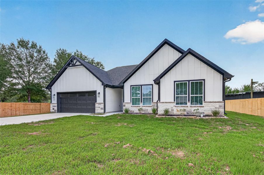 Front exterior of a new home in , Prairie View, TX, highlighting curb appeal (Image 2). Front exterior of a new home in , Prairie View, TX, highlighting curb appeal (Image 2).
