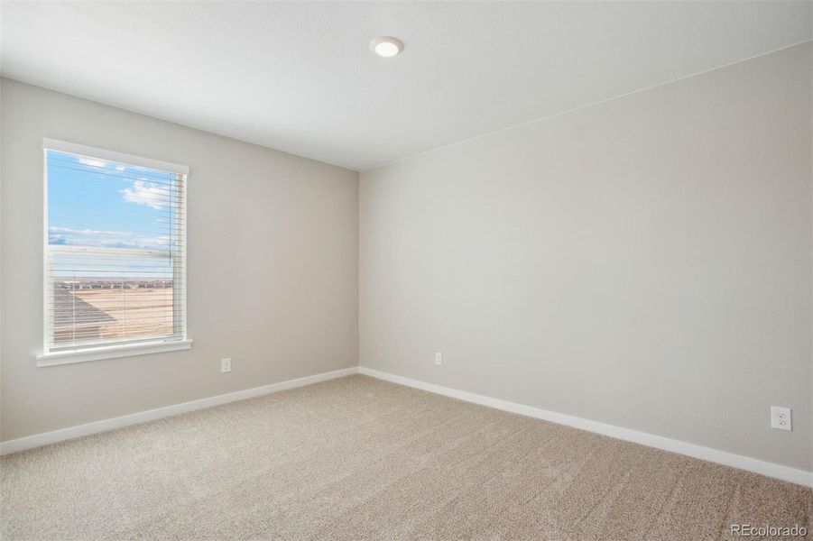 Spacious, unfurnished interior of a new home in Second Creek Farm, Commerce City (Image 18).