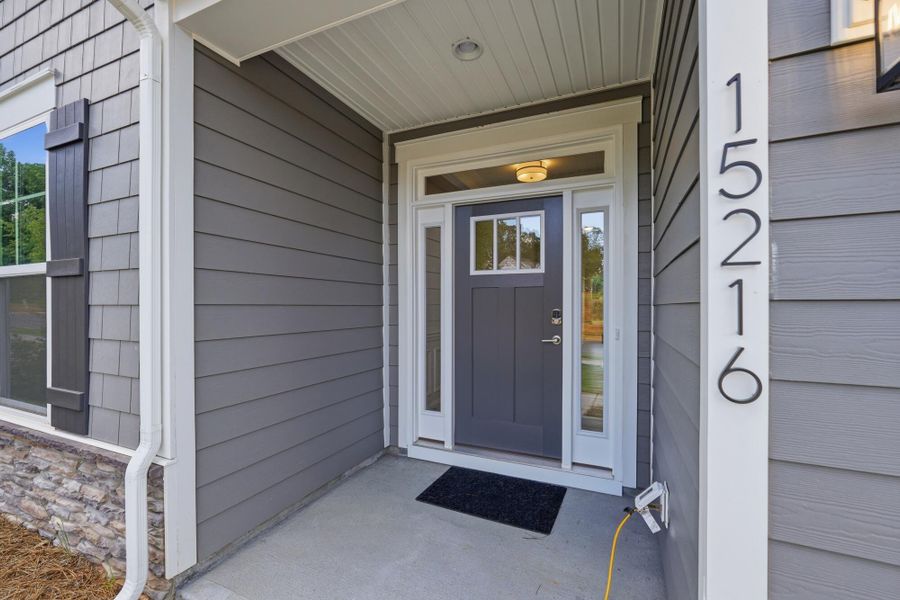 Exterior details and patio area of a home in Enclave at Riverdale, Huntersville (Image 2). Exterior details and patio area of a home in Enclave at Riverdale, Huntersville (Image 2).