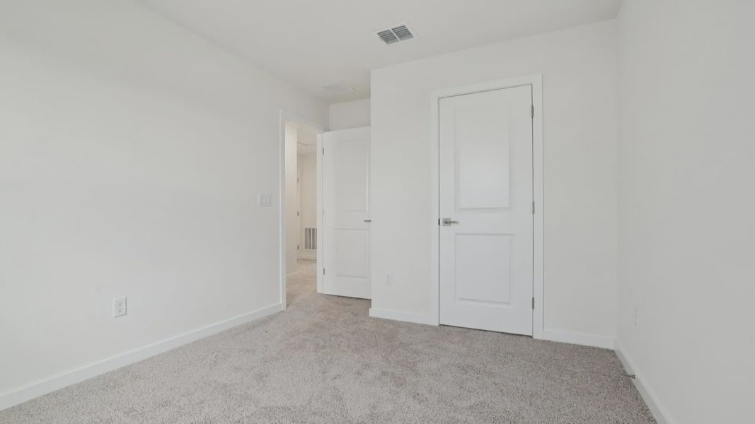 Secondary Bed of the Coronado - End at Cyrene at Harmony located in St Cloud FL by DRB Homes