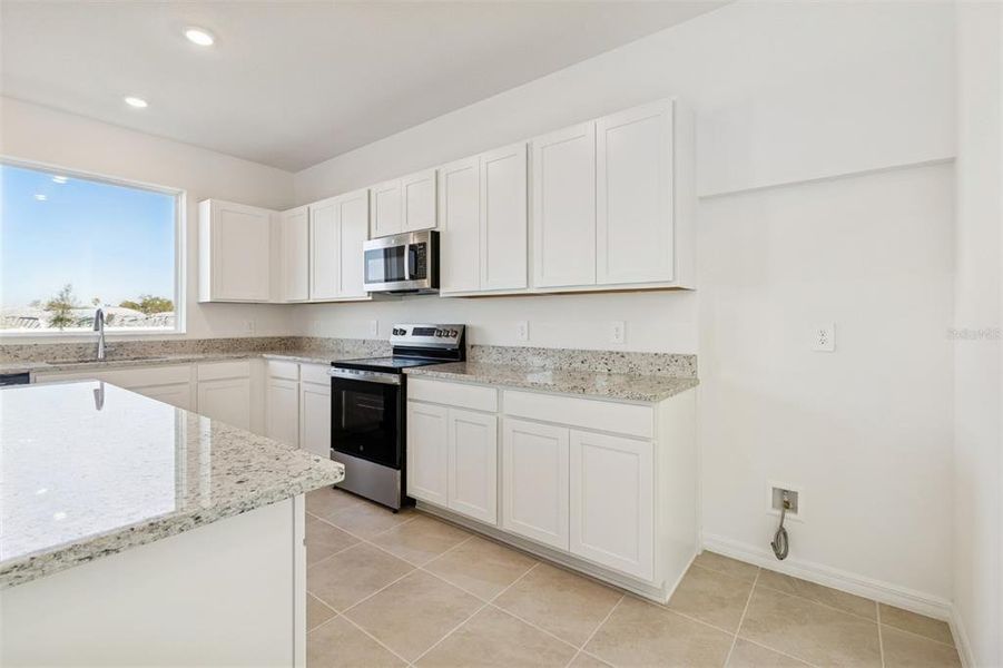 Furnished interior view inside a new home in Southpointe, Palmetto (Image 6).