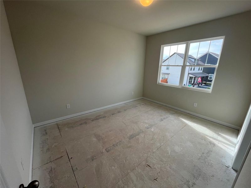 In-progress construction of a new home in The Cottages at Lariat, Liberty Hill, TX (Image 31).