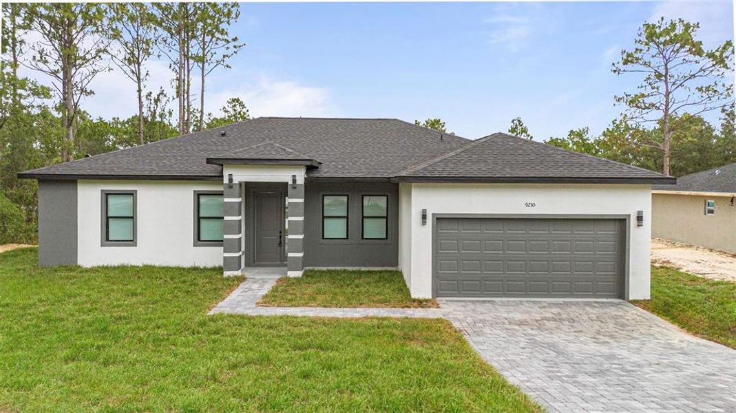 Front exterior of a new home in , Citrus Springs, FL, highlighting curb appeal (Image 19).