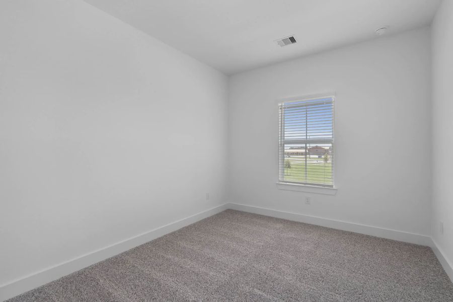 Representative unfurnished interior of a home built from the St Andrews by Chesmar Homes in Riceland Alley Loads, Mont Belvieu (Image 51).