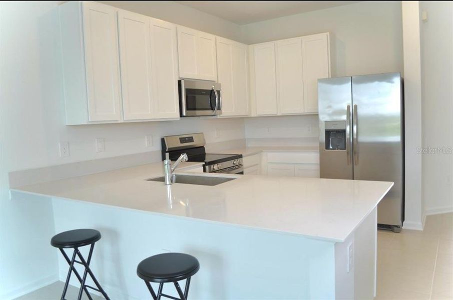Furnished interior view inside a new home in , Davenport (Image 3). Furnished interior view inside a new home in , Davenport (Image 3).