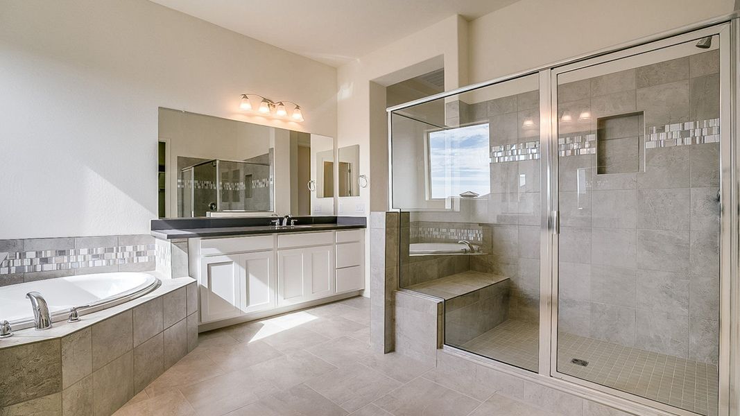 Explore the primary bathroom inside this DRB Homes residence at Lot 30, 19915 W Mulberry Drive in Arroyo Seco, Buckeye, AZ. Explore the primary bathroom inside this DRB Homes residence at Lot 30, 19915 W Mulberry Drive in Arroyo Seco, Buckeye, AZ.