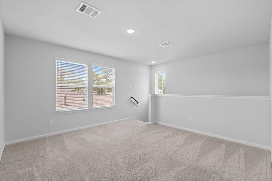 Spacious, unfurnished interior of a new home in Lakes at Black Oak, Magnolia (Image 22).