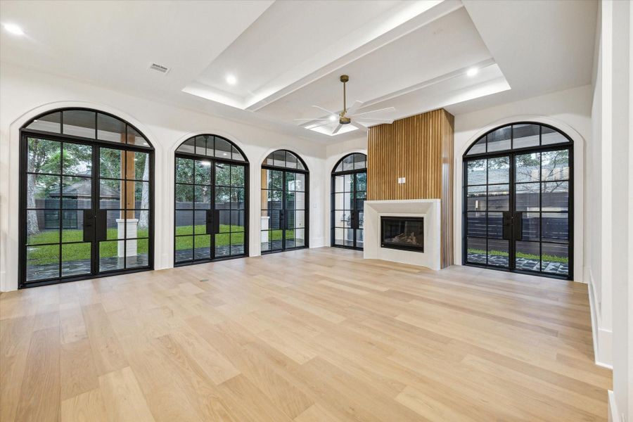 Open spacious living room with tons of natural light*Picture is of a recently constructed home by the builder.  1519 Candlelight will be similar in quality, but these pictures are not meant to be an exact representation of the new home. Specs of home may change at sole discretion of the seller.