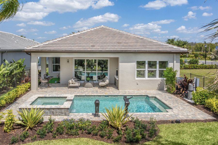 Representative exterior photo of a completed home built from the Claudia by GL Homes in Valencia Ridge, Wesley Chapel, FL (Image 18). Representative exterior photo of a completed home built from the Claudia by GL Homes in Valencia Ridge, Wesley Chapel, FL (Image 18).