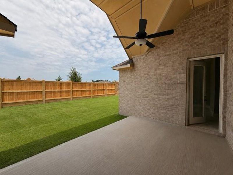 Exterior details and patio area of a home in The Meadows at Imperial Oaks, Spring (Image 3).
