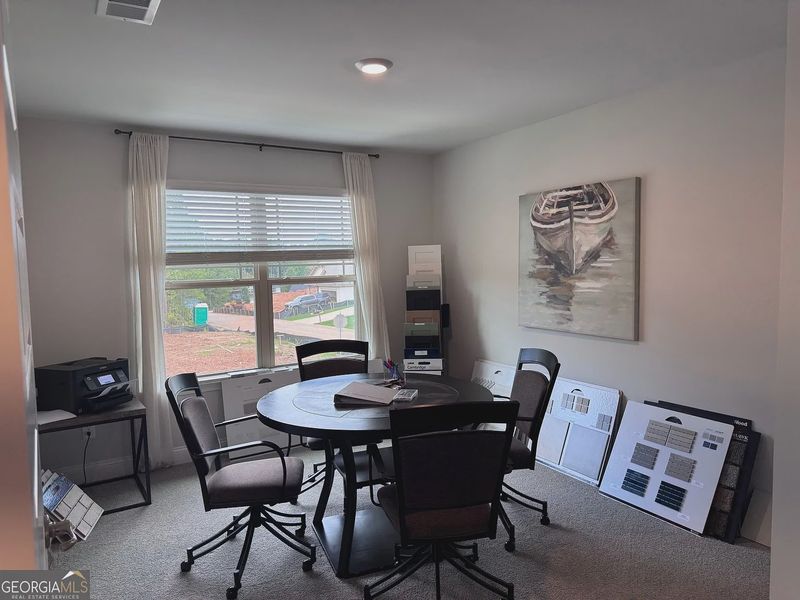 Furnished interior view inside a new home in Magnolia Villas, Cornelia (Image 15).