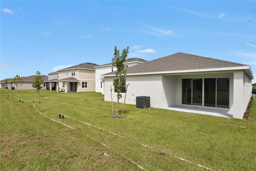Exterior details and patio area of a home in Annabelle Estates, Winter Haven (Image 3).