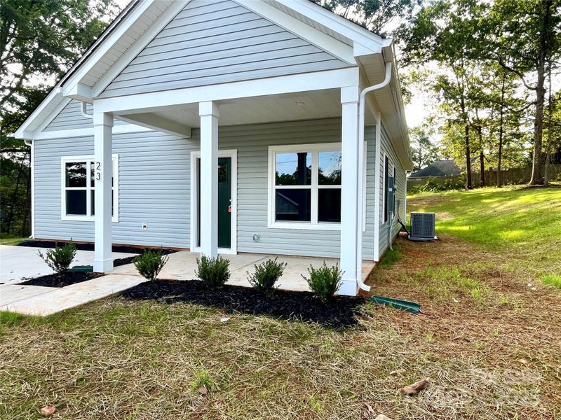 Front exterior of a new home in , Granite Falls, NC, highlighting curb appeal (Image 17).