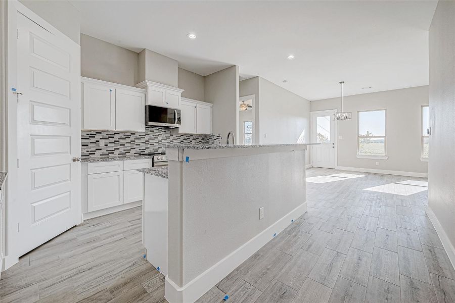 Furnished interior view inside a new home in , Needville (Image 13).