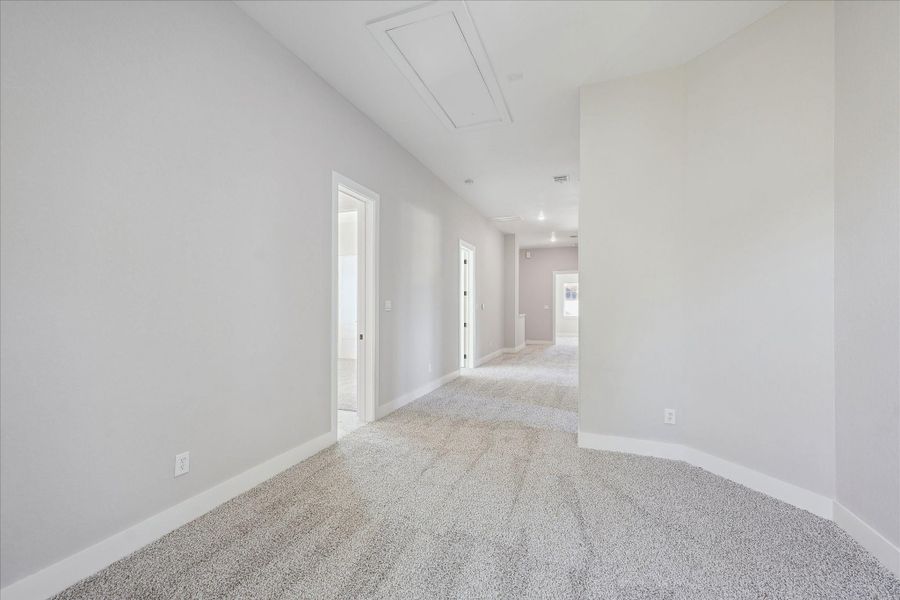 View from the Upstairs Game Room towards the Bedrooms and Media Room