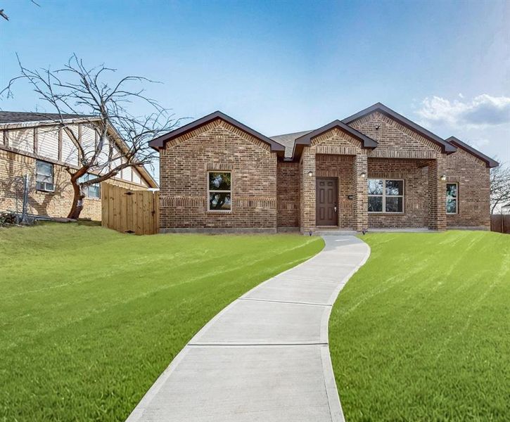 Front exterior of a new home in , Lancaster, TX, highlighting curb appeal (Image 1). Front exterior of a new home in , Lancaster, TX, highlighting curb appeal (Image 1).