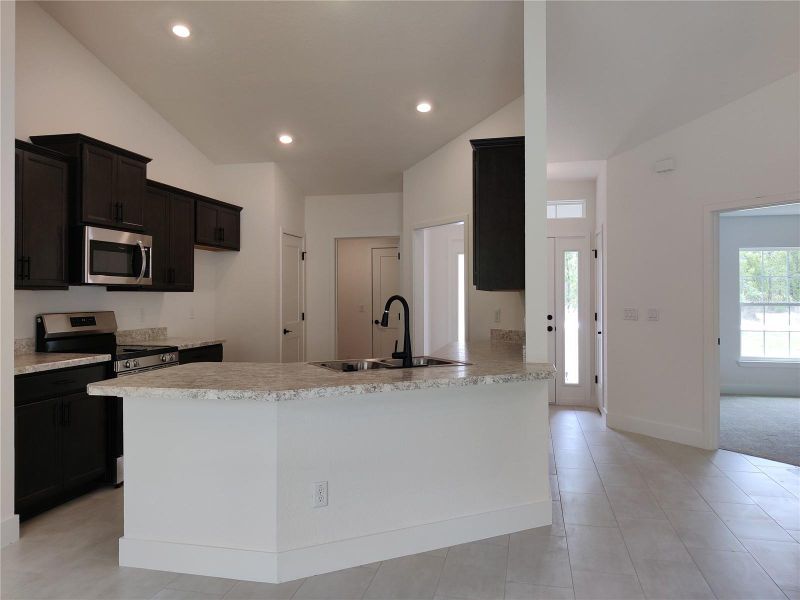 Furnished interior view inside a new home in Royal Highlands, Weeki Wachee (Image 4).