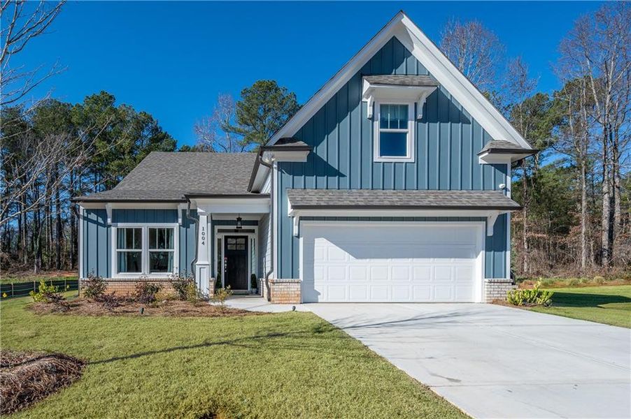 Front exterior of a new home in , Canton, GA, highlighting curb appeal (Image 22).