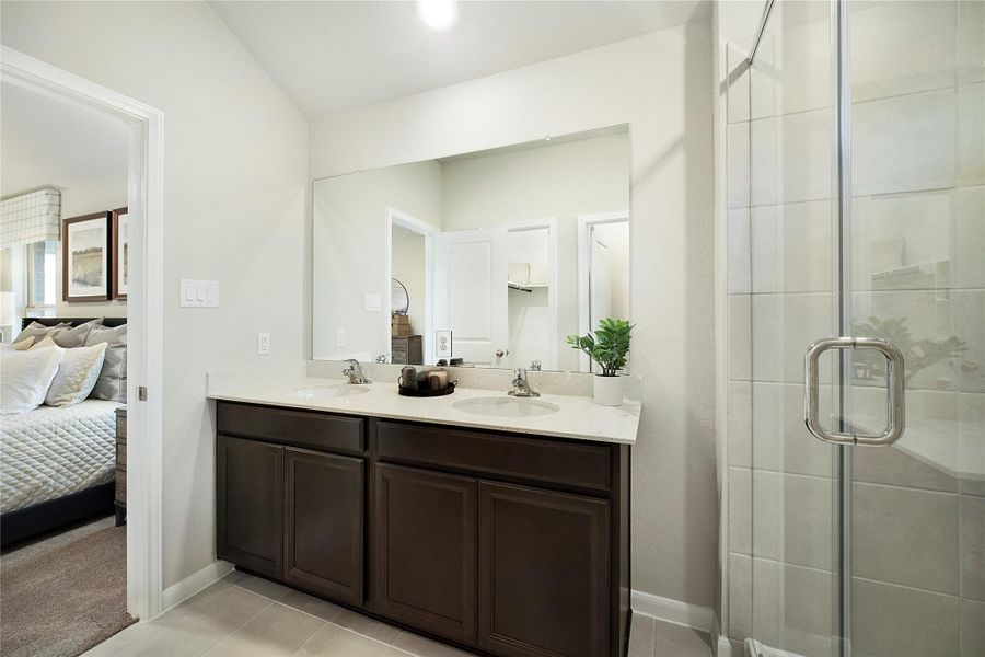 Sample photo of completed home with similar floor plan. As-built color and selections may vary.