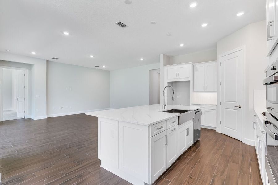 Representative furnished interior of a home built from the Letizia by Taylor Morrison in Esplanade at Center Lake Ranch, St. Cloud (Image 9).