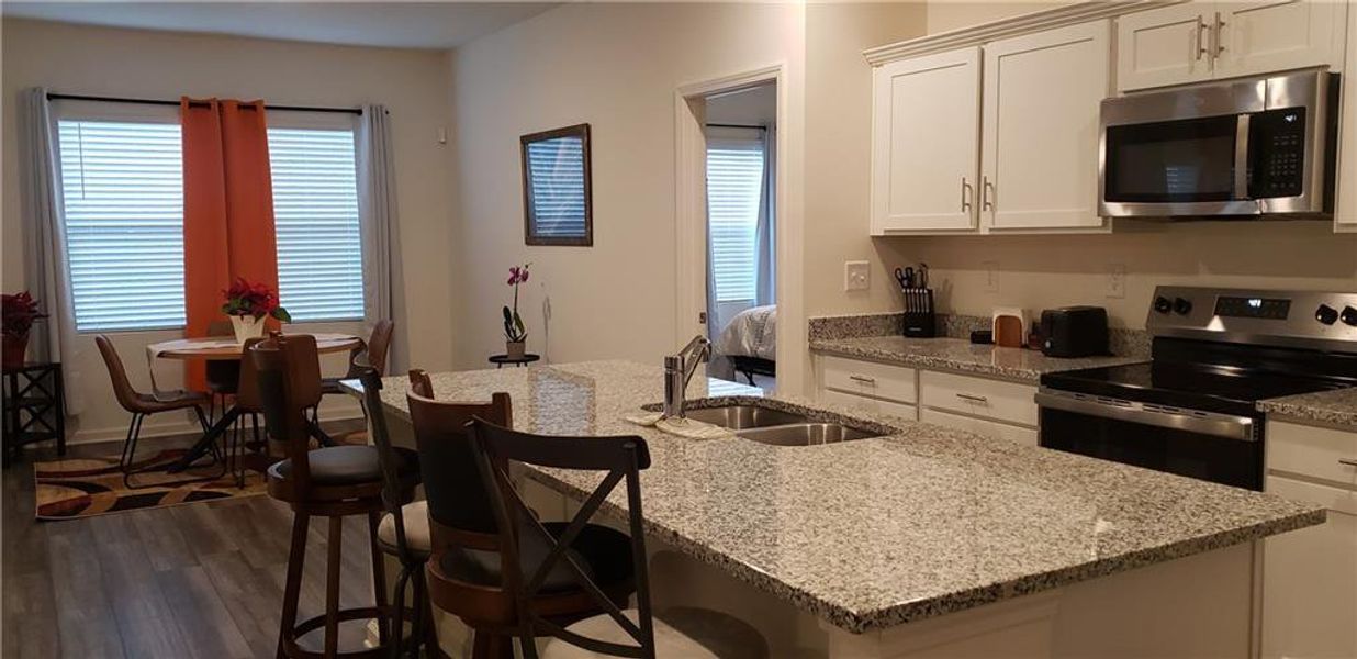 Furnished interior view inside a new home in Greyson Parc, Locust Grove (Image 8).
