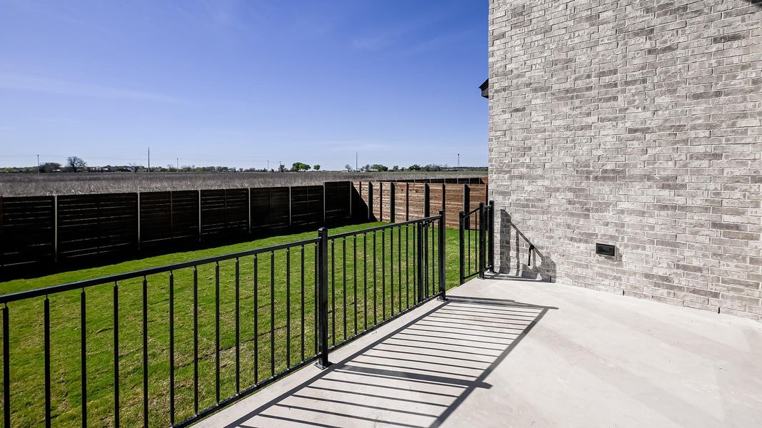 Exterior details and patio area of a home in Juniper Springs, Lockhart (Image 18).