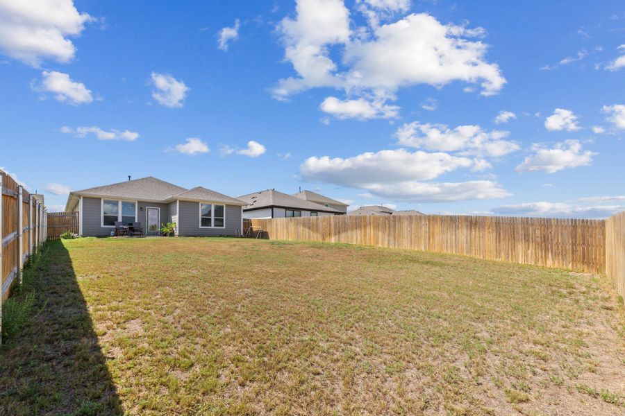 Exterior details and patio area of a home in The Ridge at Trinity Ranch, Elgin (Image 20). Exterior details and patio area of a home in The Ridge at Trinity Ranch, Elgin (Image 20).