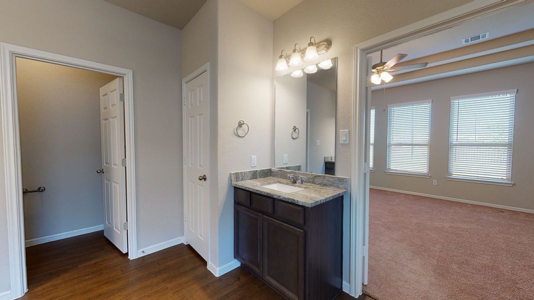 Representative furnished interior of a home built from the Floor Plan 3256 by Colina Homes in Grand Magnolia, Magnolia (Image 15).