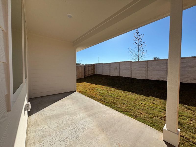 Exterior details and patio area of a home in Cannon Ranch 40s, Dripping Springs (Image 20).