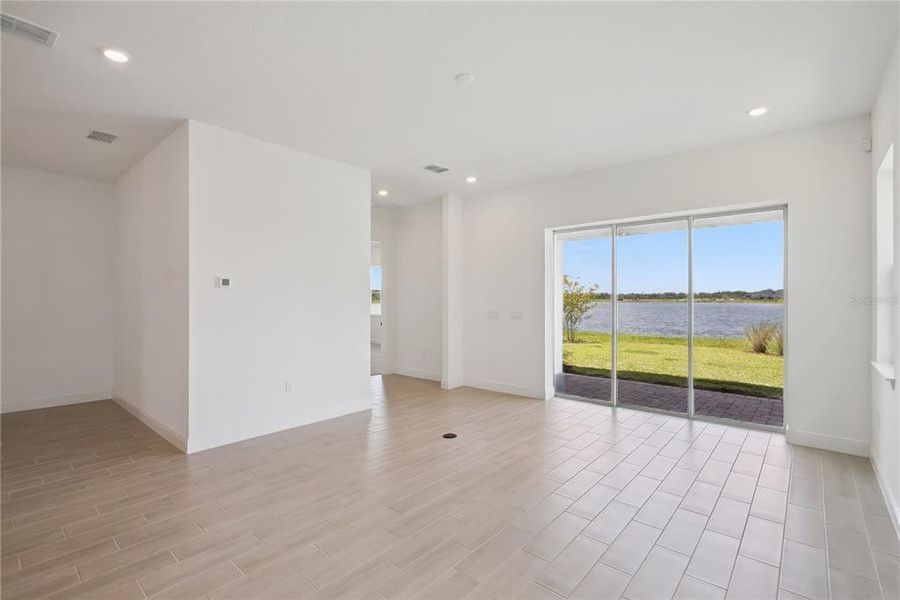 Spacious, unfurnished interior of a new home in Laureate Park, Orlando (Image 36).