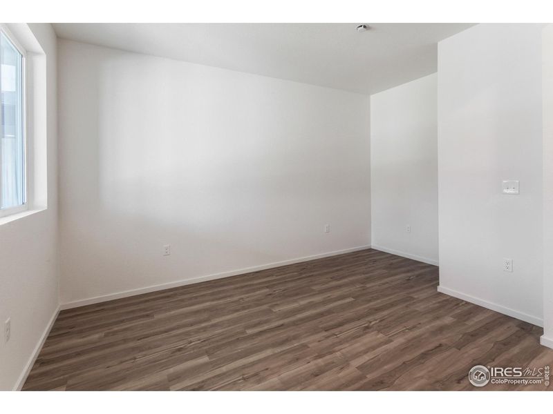 Spacious, unfurnished interior of a new home in Granary Trailblazer Collection - Single Family Homes, Johnstown (Image 35).