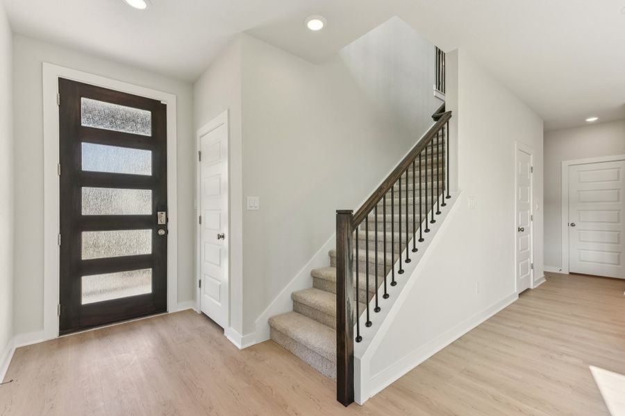 A staircase in a house. A staircase in a house.