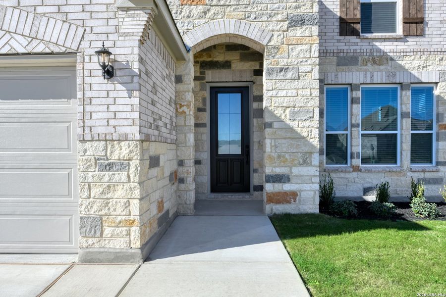 Exterior details and patio area of a home in Megan's Landing, Castroville (Image 3).