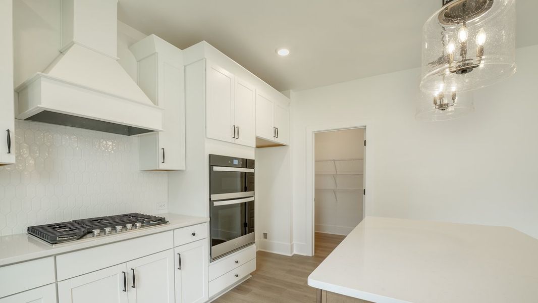 Representative furnished interior of a home built from the Hanover by D.R. Horton in The Village at Sandy Plains, Marietta (Image 7).