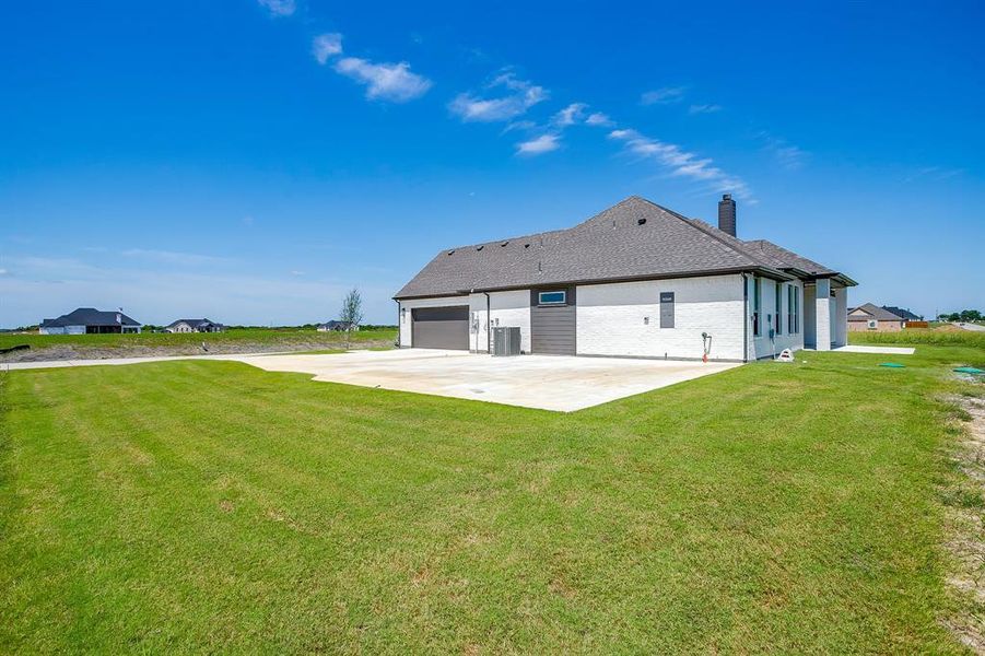 Exterior details and patio area of a home in Matthews Farm, Venus (Image 4).