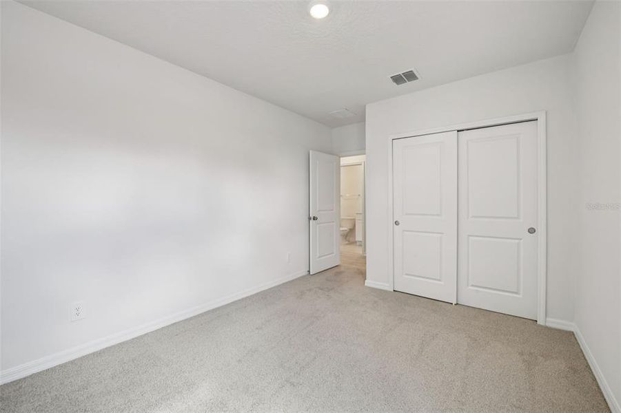 Spacious, unfurnished interior of a new home in Ridgehaven - Villas, Ormond Beach (Image 24).