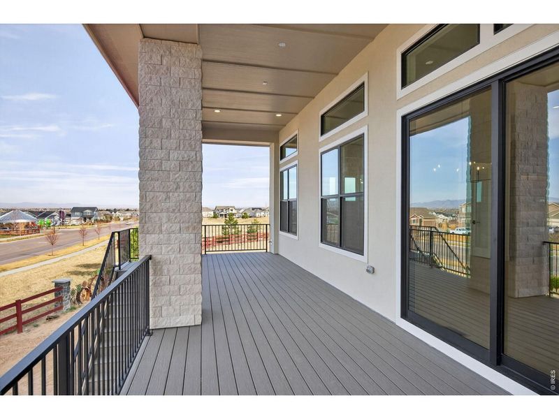 Exterior details and patio area of a home in RainDance, Windsor (Image 28).