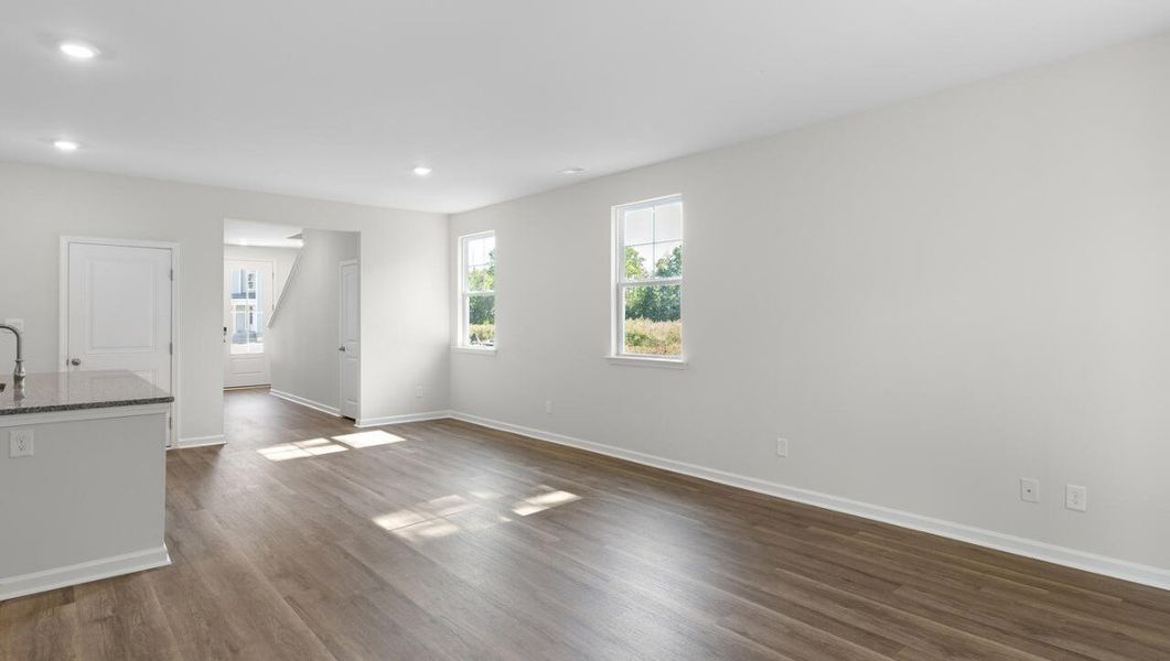 Representative unfurnished interior of a home built from the WOODSTOCK by D.R. Horton in Surfside Landing, Hubert (Image 17).