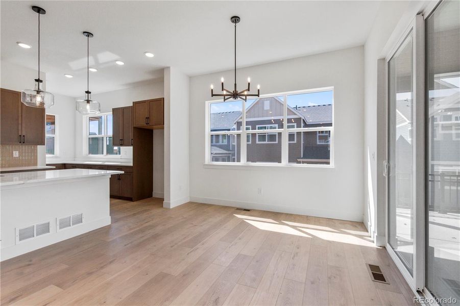 Furnished interior view inside a new home in Dillon Pointe - Journey, Westminster (Image 4).
