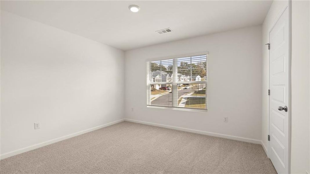Spacious, unfurnished interior of a new home in Brooks Station, Dacula (Image 27).