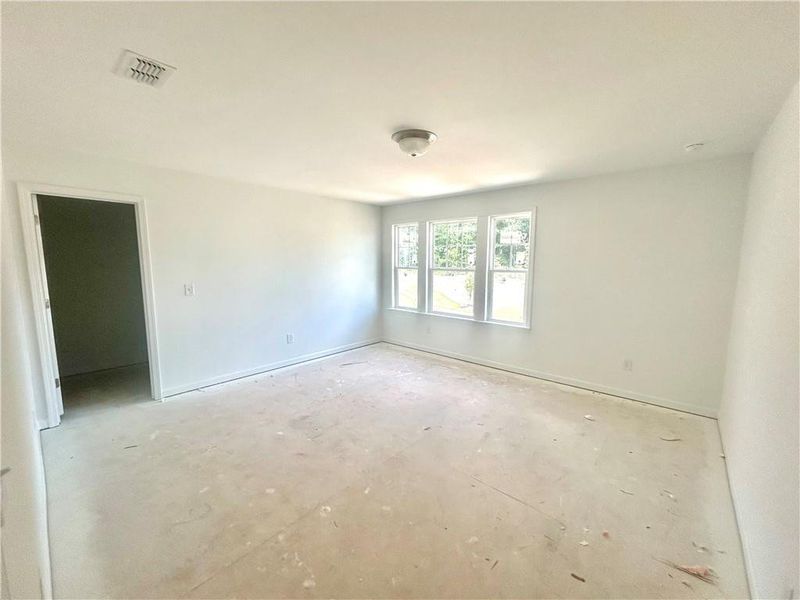 Spacious, unfurnished interior of a new home in The Pointe at Heron Bay, Locust Grove (Image 8). Spacious, unfurnished interior of a new home in The Pointe at Heron Bay, Locust Grove (Image 8).