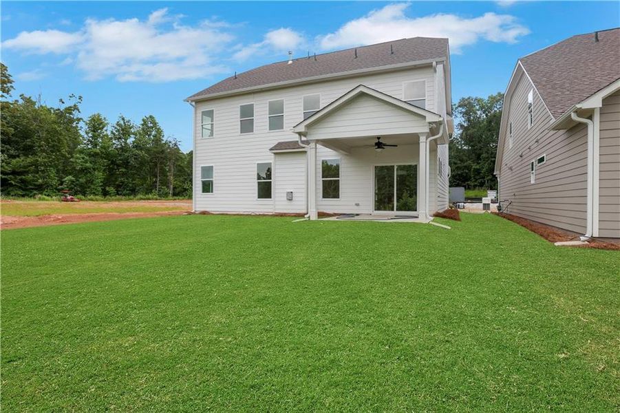 Exterior details and patio area of a home in Marble Tree, Ball Ground (Image 29).