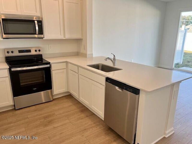 Furnished interior view inside a new home in The Landing, Middleburg (Image 9).
