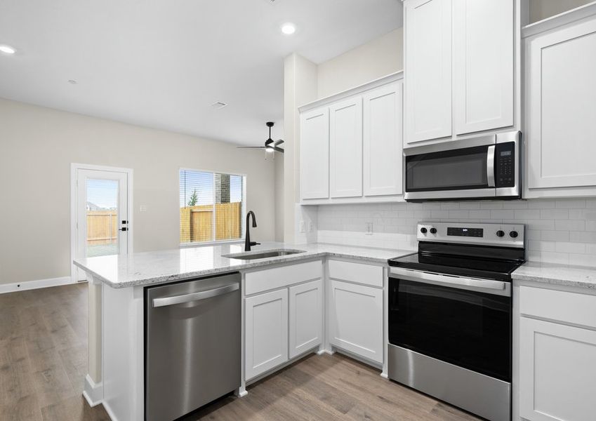 The kitchen has energy-efficient appliances.