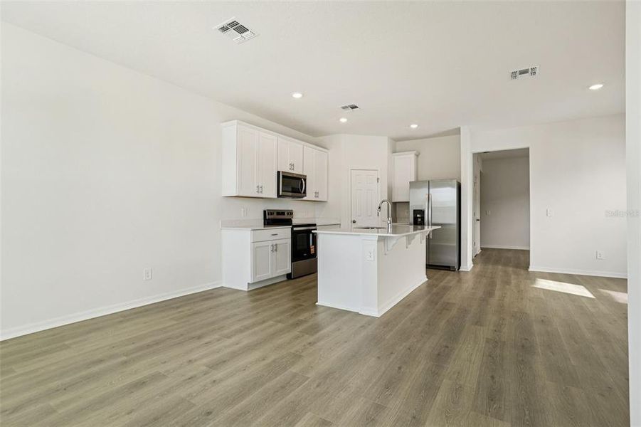 Furnished interior view inside a new home in The Meadow at Crossprairie Bungalows, St. Cloud (Image 8).