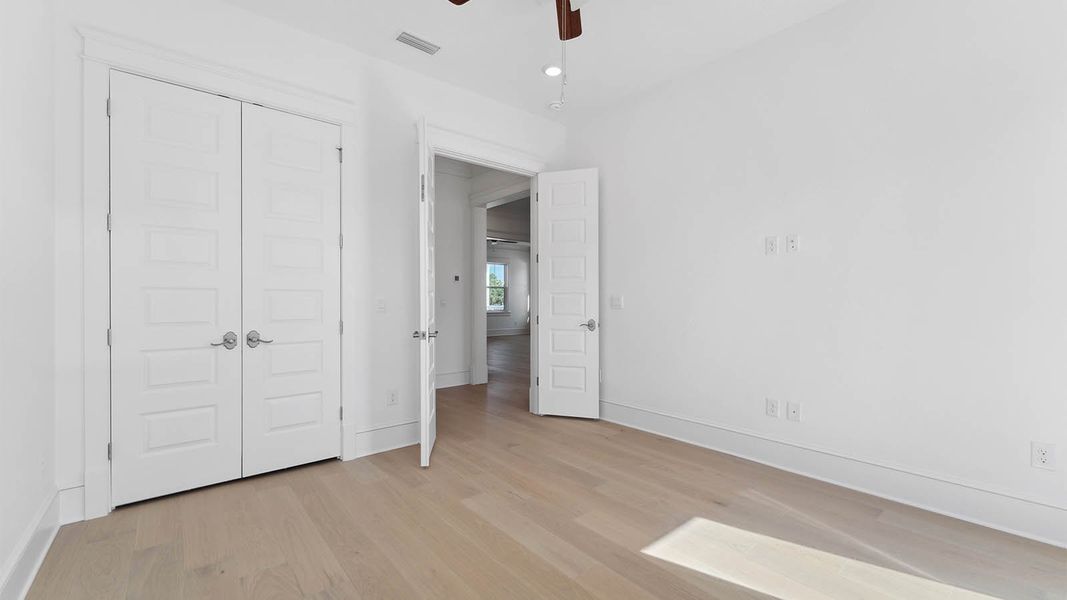 Representative unfurnished interior of a home built from the Cayman by D.R. Horton in Parkside, Santa Rosa Beach (Image 26).